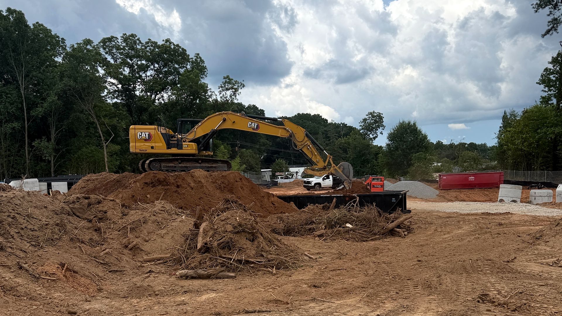 Excavator on a cleared commercial site in Alpharetta, Georgia