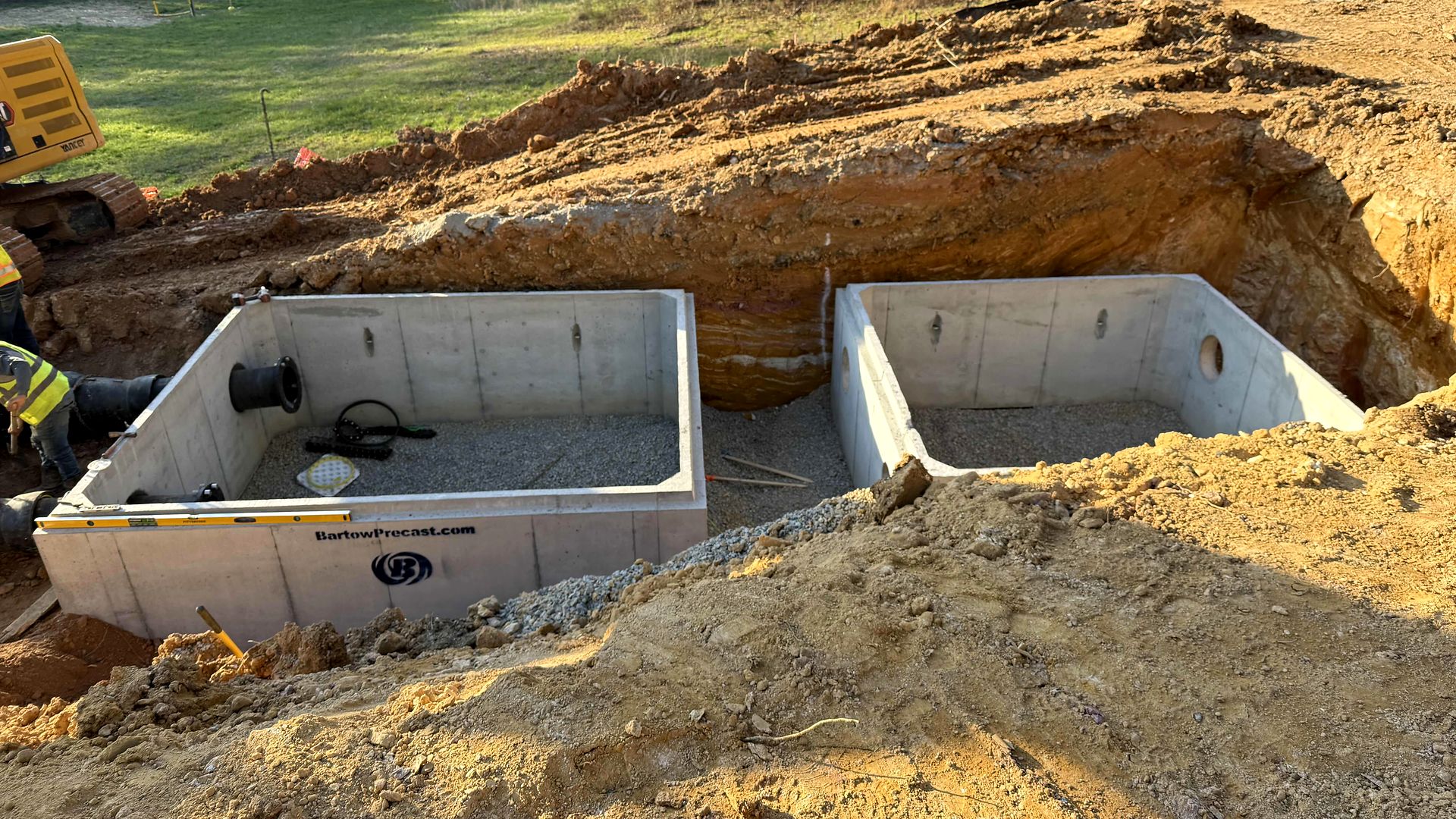 Two precast concrete vaults set in an open excavation in Bartow County, Georgia